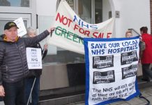 Protesters outside the special adminstrator’s press conference yesterday