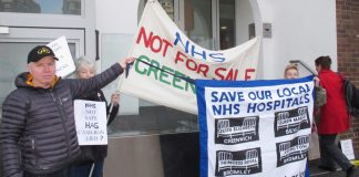 Protesters outside the special adminstrator’s press conference yesterday