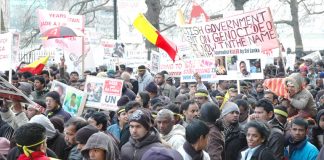 Marchers in London on January 31 2009 condemn the silence of the British government in response to the massacre of Tamils by the Sri Lankan army