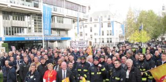 Firefighters outside Central Hall Westminster yesterday before going on to lobby MPs against plans to make savage cuts to the fire service