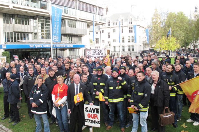 Firefighters outside Central Hall Westminster yesterday before going on to lobby MPs against plans to make savage cuts to the fire service