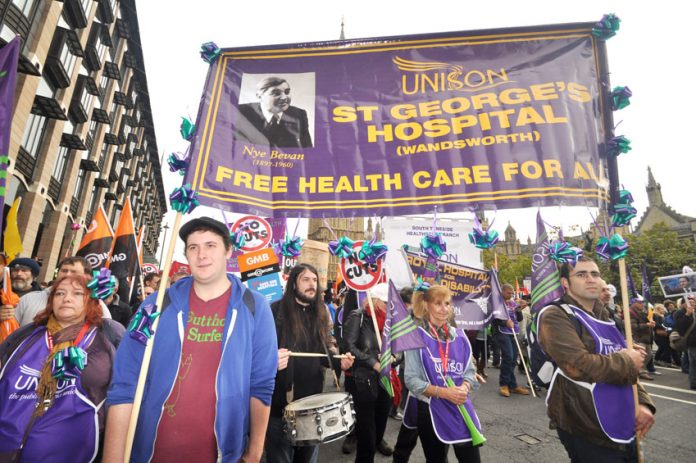 Health workers marched on the TUC demonstration on October 20th to defend free healthcare for all – now they are facing an avalanche of attacks and they are demanding the unions fight them