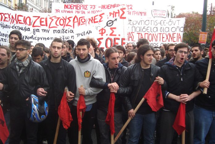 Greek youth, part of the massive demonstration that marched to the US and Israeli embassies in support of the Palestinian people