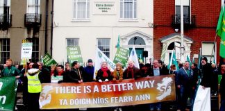 Sinn Fein banner on last Saturday’s 20,000 strong march in Dublin. So far, 360,000 jobs have been cut in Ireland