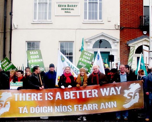 Sinn Fein banner on last Saturday’s 20,000 strong march in Dublin. So far, 360,000 jobs have been cut in Ireland