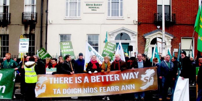 Sinn Fein banner on last Saturday’s 20,000 strong march in Dublin. So far, 360,000 jobs have been cut in Ireland