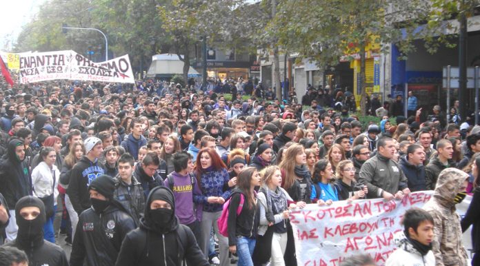 School students marching in Athens the banner reads ‘They have killed Alexis, they are stealing our life – struggle for their overthrow!’