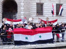 Syrians demonstrate outside the Foreign Office in London to show their support for President Assad against the British government’s support for the opposition