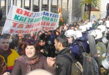 Marchers pushed aside the fence around the Greek parliament and chanted ‘Bread, Education and Freedom’