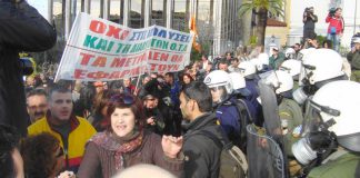 Marchers pushed aside the fence around the Greek parliament and chanted ‘Bread, Education and Freedom’