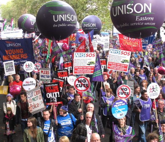 Unison members demand ‘No NHS cuts or privatisation’ on the TUC 500,000-strong demonstration in London last October