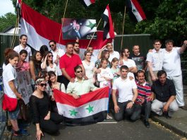 ‘WE ARE IN A STATE OF WAR – repelling a fierce outside aggression’ says Assad Youth and workers rally in support of Assad in central London outside the Syrian embassy