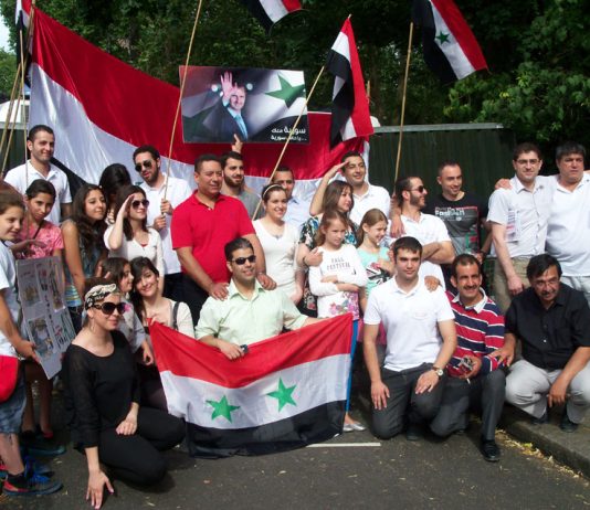 Youth and workers rally in support of Assad in central London outside the Syrian embassy
