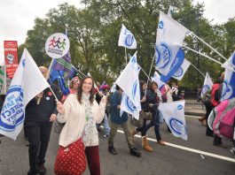 Midwives marching with their flags on last October’s 500,000-strong TUC demonstration against the Coalition’s austerity cuts