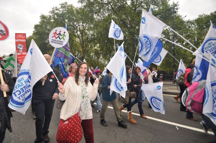 Midwives marching with their flags on last October’s 500,000-strong TUC demonstration against the Coalition’s austerity cuts