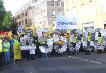 Irish workers on a ICTU demonstration show the high unemployment because of the  EU -IMF-ECB imposed cuts that are being carried out by the government