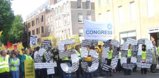 Irish workers on a ICTU demonstration show the high unemployment because of the  EU -IMF-ECB imposed cuts that are being carried out by the government