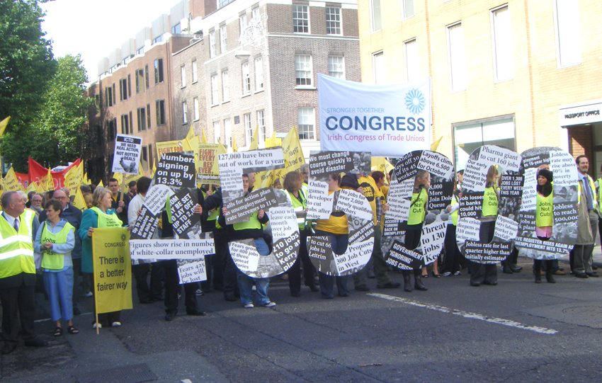 Irish workers on a ICTU demonstration show the high unemployment because of the  EU -IMF-ECB imposed cuts that are being carried out by the government