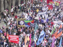 Teachers’ Unions Slam Coalition League Tables NUT banners on the march. The NUT regards league tables as a distraction from the hard work teachers do