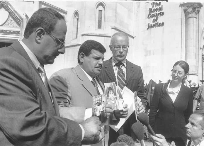 Colonel Daoud Musa, father of Baha Musa (who was tortured to death by British troops)  outside the High Court with Public Interest lawyers in 2004