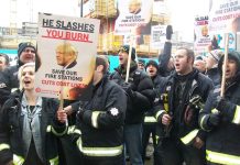 Firefighters demanding no cuts to the service outside yesterday’s meeting of the Fire Authority