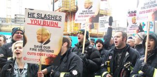 Firefighters demanding no cuts to the service outside yesterday’s meeting of the Fire Authority
