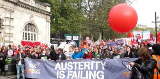 One of the lead banners on the TUC march in London last October 26 – four months later workers are more determined than ever to get rid of the coalition