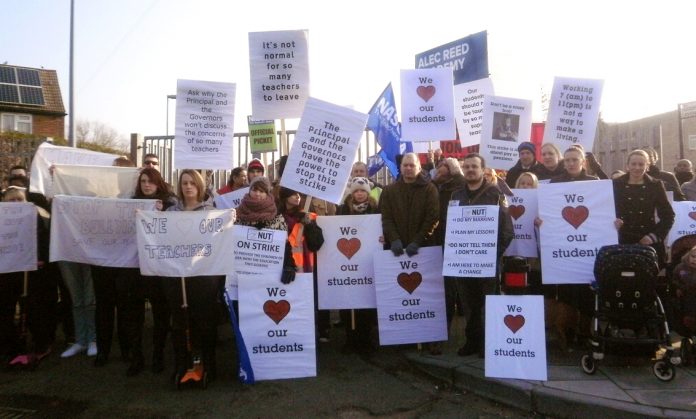 Large numbers of parents and pupils picketed alongside teachers during the dispute the Alec Reed Academy