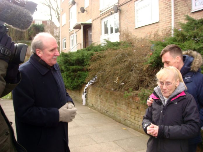 Tenant Joan Elsby and her son Kevin with Crown Properties executive Nick Wood, BBC cameras looking on.