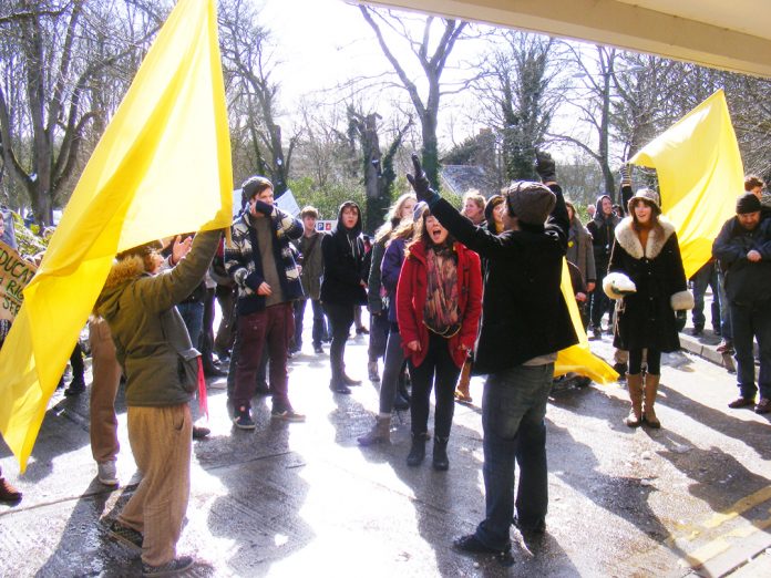 Students, teachers and staff holding a ‘noise demonstration’ during yesterday’s march against privatisation