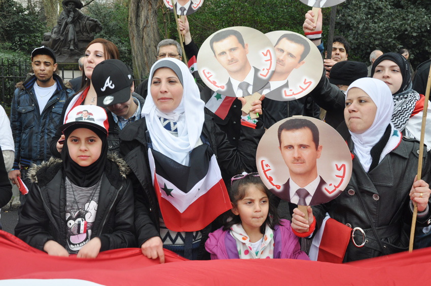 Syrian women and children supporting President Assad outside the Syrian Embassy last year