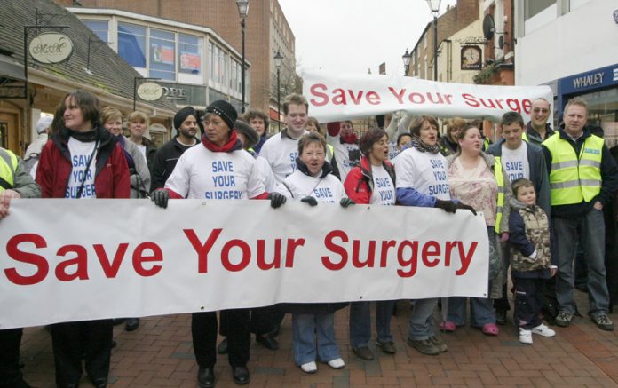 GPs in Rugby march against attacks on the NHS