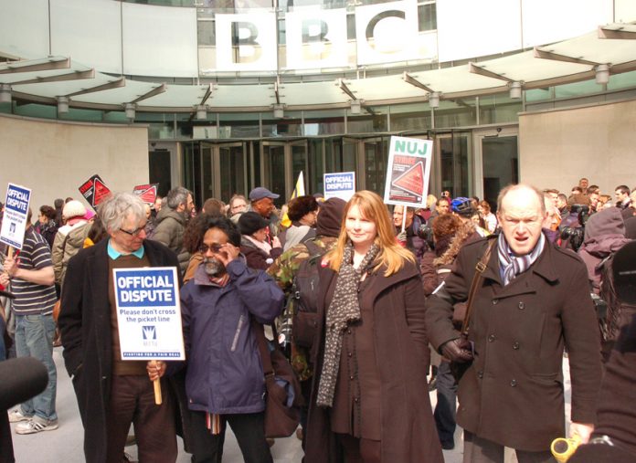 NUJ general secretary Michelle Stanistreet (second from right), and BECTU general secretary GERRY MORRISSEY (right) outside Broadcasting House with BBC journalists and technicians at noon yesterday at the beginning of a 12-hour national strike