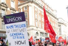 Workers on the TUC march last October making it clear they want a general strike now!