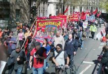 A section of the May Day march in London making its way to Trafalgar Square yesterday afternoon