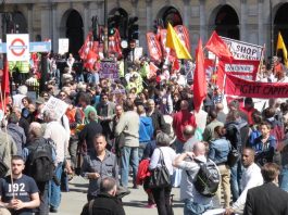 May Day – Trade Unionists Demand A General Strike! The London May Day march arrives in Trafalgar Square for the rally