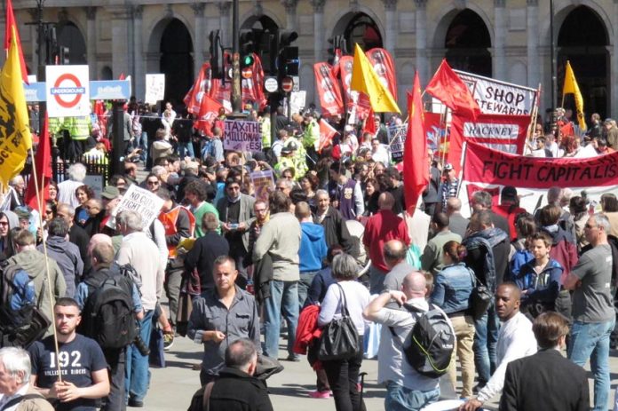 The London May Day march arrives in Trafalgar Square for the rally
