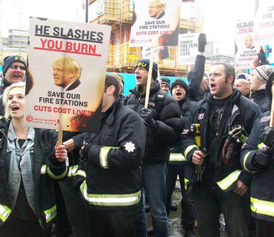 Firefighters demonstrating outside the London Fire Authority on February 11 against plans to close 12 fire stations in London