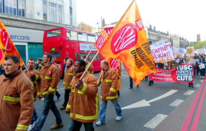 Hundreds march through Brixton on Thursday night to defend their fire station