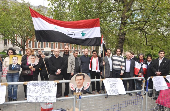 Syrians demonstrate outside the US embassy in London on Saturday in support of president Assad and against the imperialist backing for terrorists in Syria