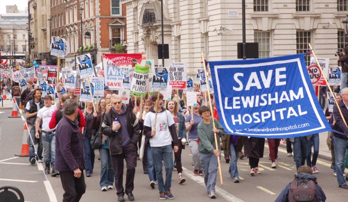 Save Lewisham Hospital campaign banner on last Saturday’s demonstration in London against the NHS cuts