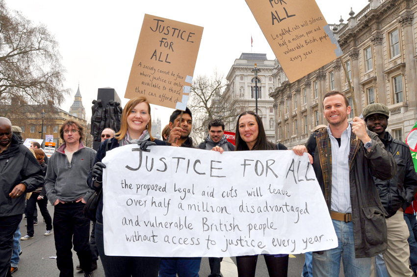 Marchers with their warning on the March 2011 TUC demonstration against the Coalition’s cuts