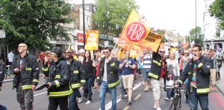 Kingsland firefighters at the head of their march in a buoyant and determined mood