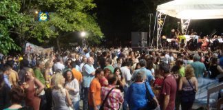 Workers listening to a classical music concert at the ERT grounds last Friday night