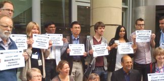 Doctors and medical students demonstrate outside the BMA ARM in support of Bahraini medical workers who are being jailed and tortured for fighting for their democratic rights