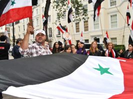 Syrian workers and youth picket the Saudi embassy in London in support of President Assad