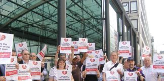 Post Office workers rally yesterday afternoon in Westminster while striking to keep Crown Post Offices open
