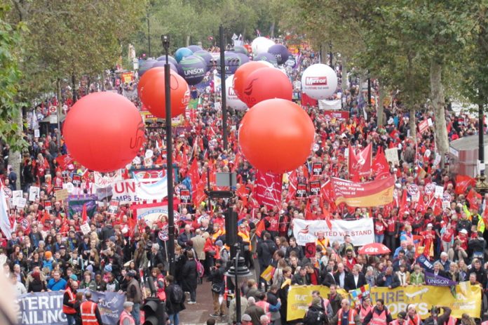 The front of last October’s 500,000-strong TUC demonstration – Miliband is determined to drive the organised trade unions out of the Labour Party