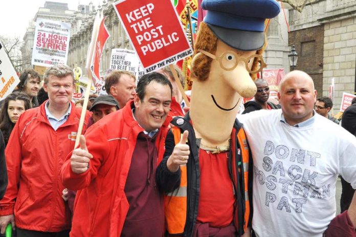 Postal workers on the 500,000-strong TUC march in 2011. They have consistently fought Royal Mail privatisation and are ready for more action