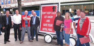 West Midlands delegation standing by a CWU campaign banner outside the CWU Policy Forum in central London showing their determination to stop privatisation